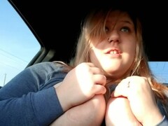 Girl plays with boobs while driving around Thumb
